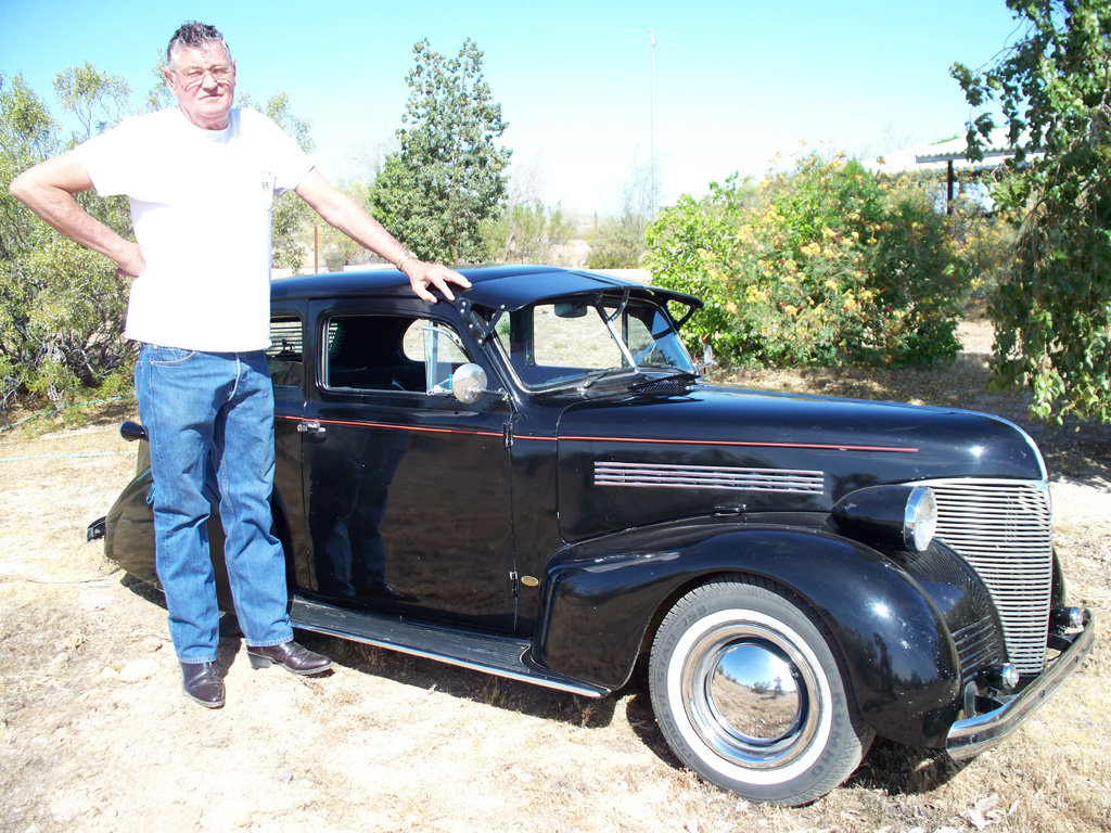 Ernie Posing With '39 Chevy Sedan Ernie posing with his miniature 1939 Chevy Sedan.