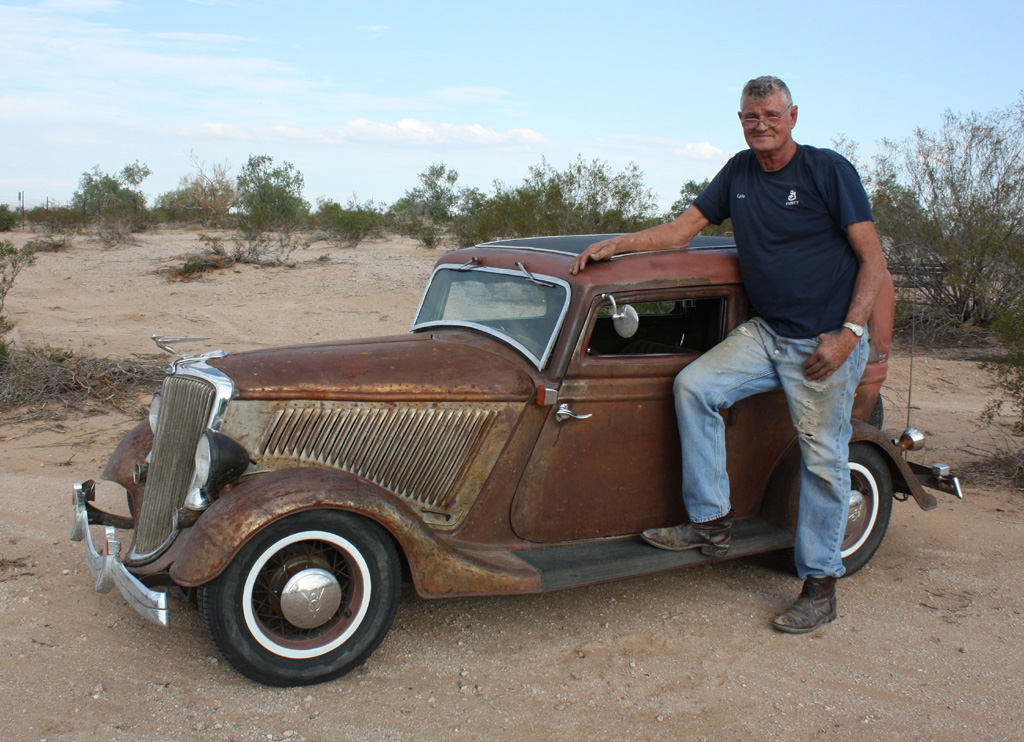 Ernie With His '34 Ford Ernie posing with his '34 Ford 2-Door Sedan "Bonnie."