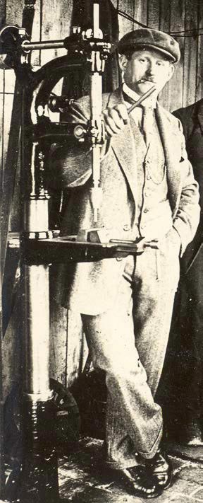John Aschauer John Aschauer posing with a machine.
