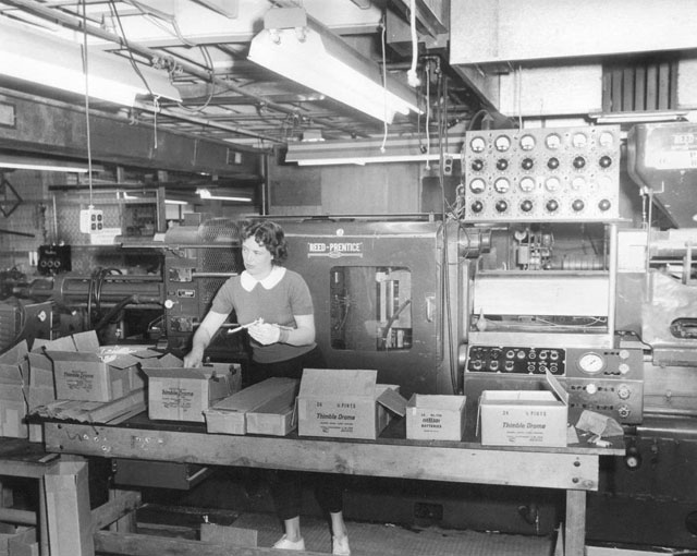 A Cox Employee in the Production Area A Cox employee in the production area.