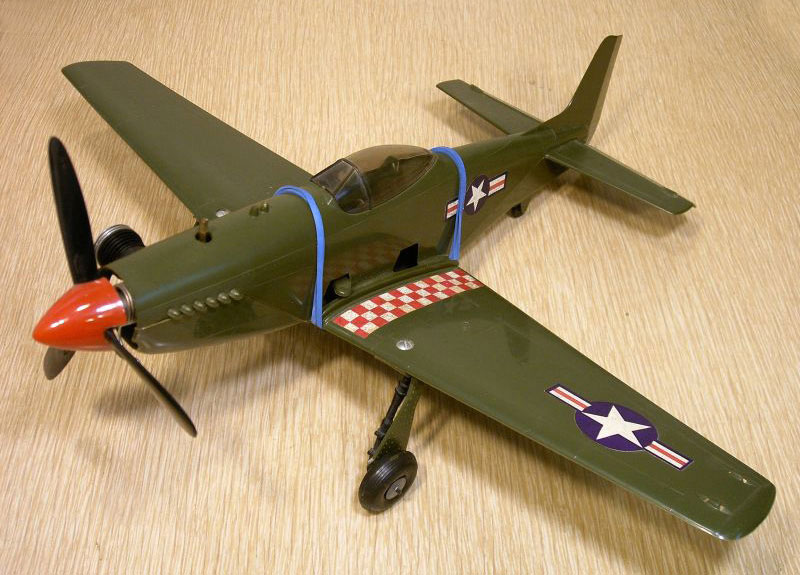 Cox P-51 A Cox P-51 Model Airplane.
