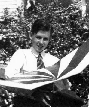 William Preston With Brown Engine William Preston holding a plane with Brown engine.
