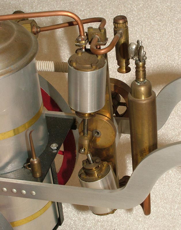 A close-up detail on the horse-drawn fire pump.