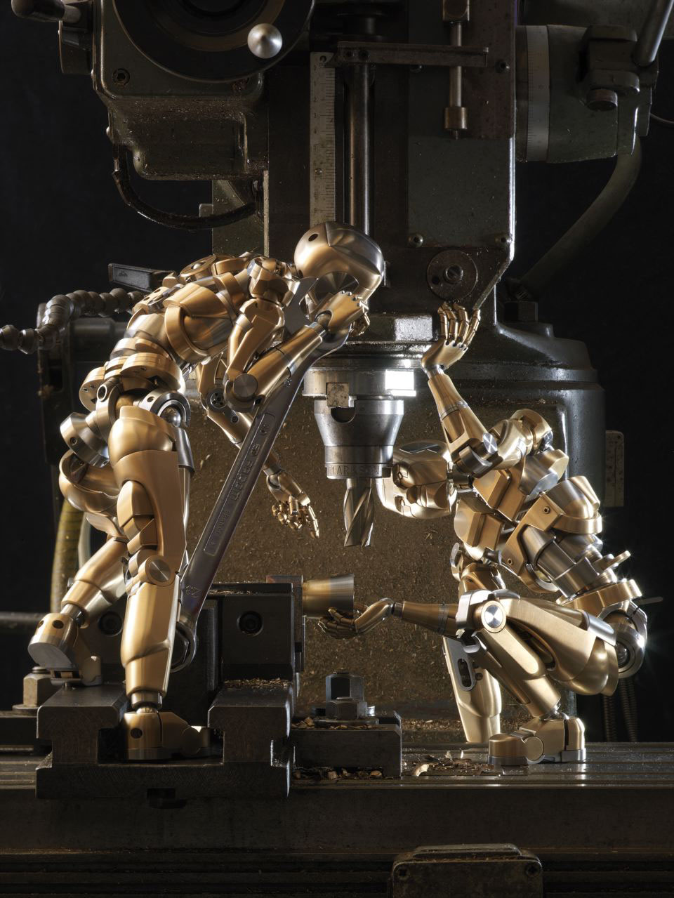 ZOHO ARTFORM Figures Two of Mark's animatronic sculptures inspecting a machine.