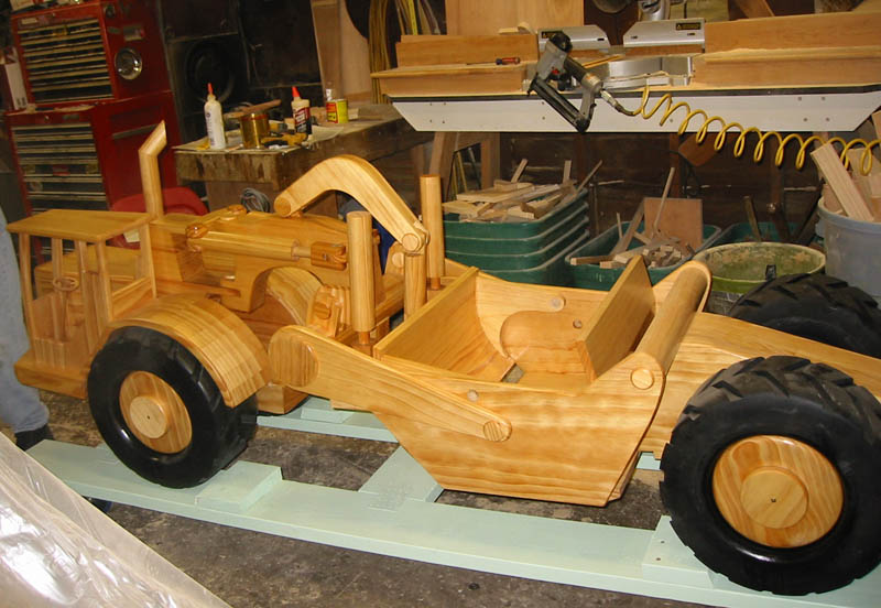 Scale Model Scraper A wooden scale model scraper sits in Chuck’s shop.