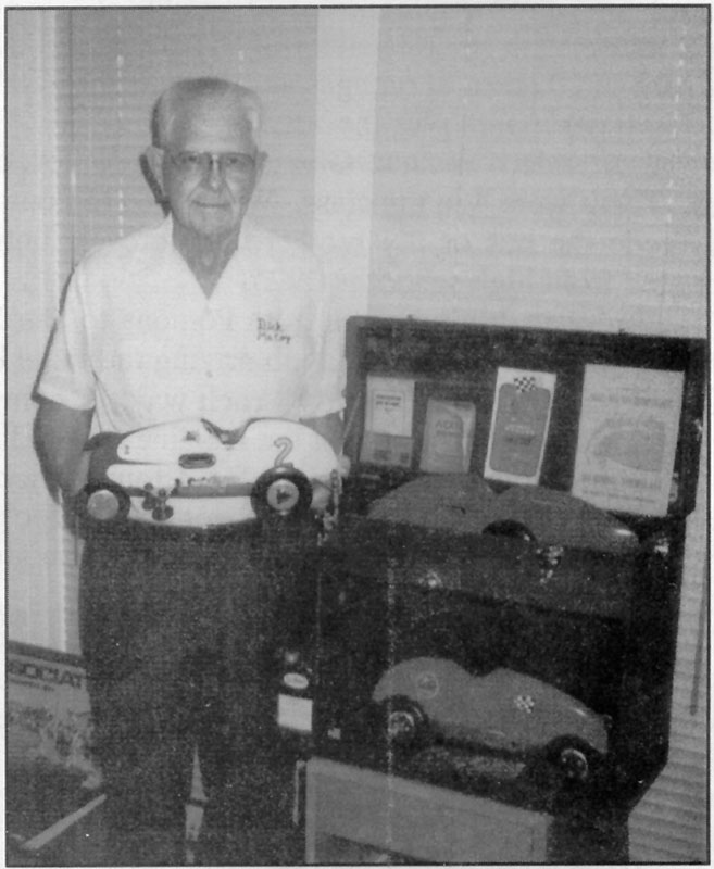 Dick With His Invader Race Car Dick holding an original 1948 Invader race car.