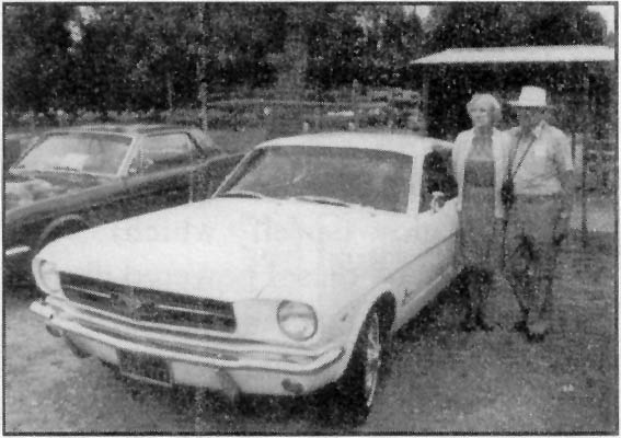 Dick and Fern McCoy Dick and Fern McCoy with their Mustang.