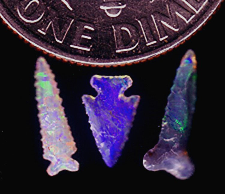 Opal Micro Arrowheads Three opal micro arrowheads.