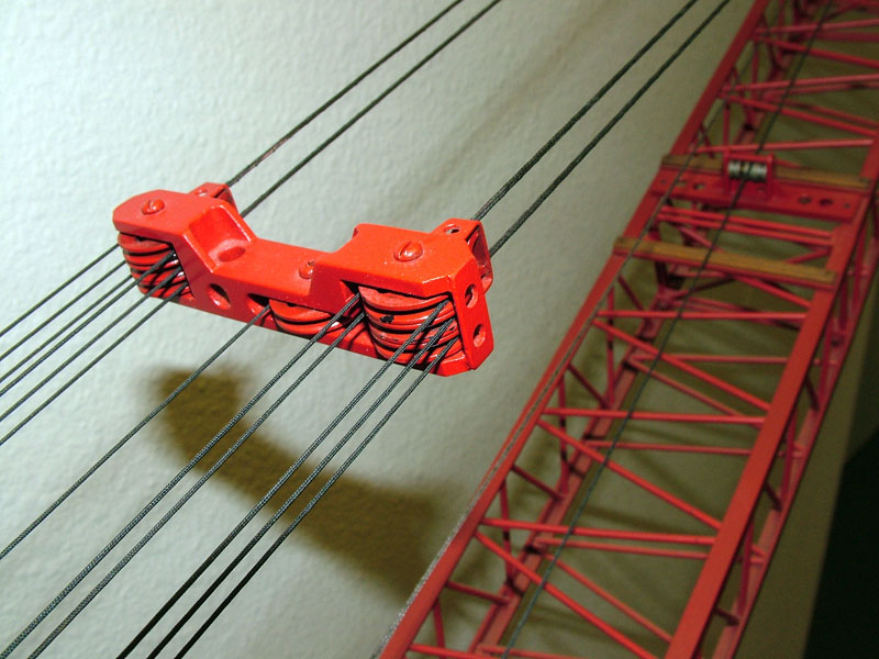 1/32 Scale Manitowoc Crane Many pulleys provide the leverage needed to lift massive weights.