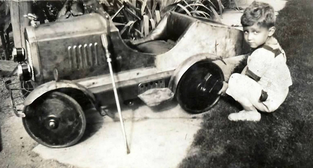 Sheridan Preston as a Boy Sheridan Preston as a young boy working on his pedal car.