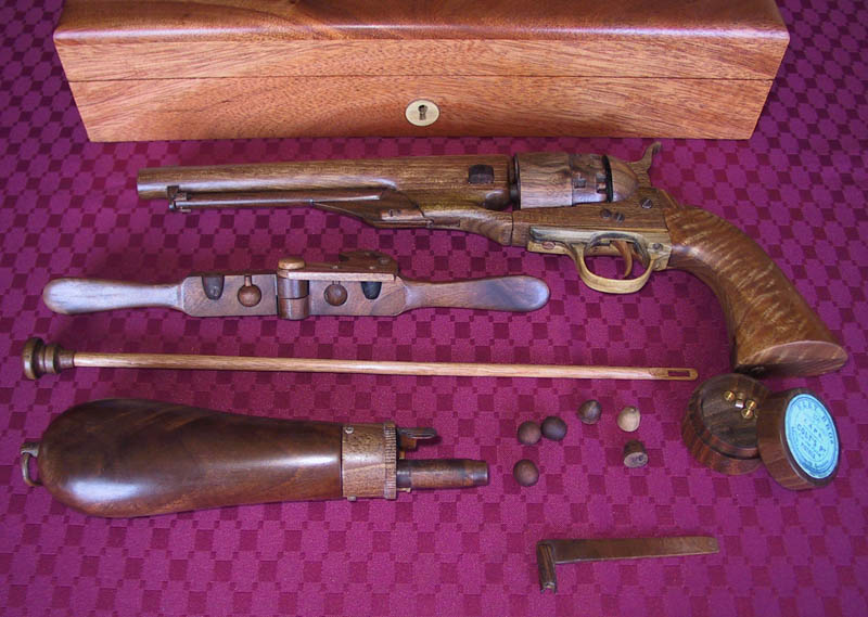 Colt Army Revolver The assembled Colt Army revolver with loading equipment.