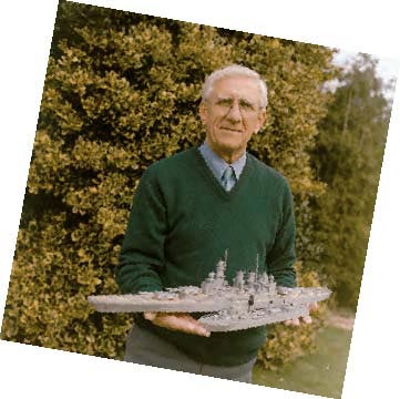 Philip Warren Displaying His Models Philip Warren displays two of his matchstick model ships.