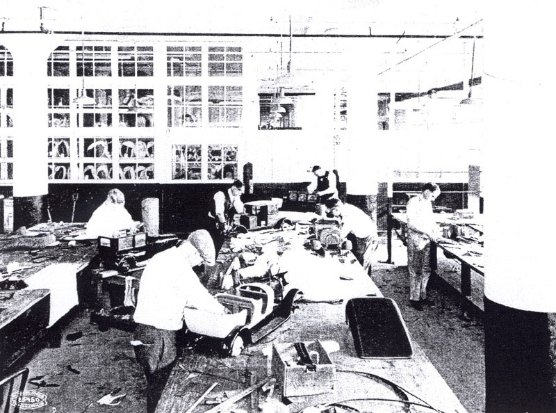 The Marmon Workshop Craftsmen at work on the 1/4 scale model cars in the Marmon shop.