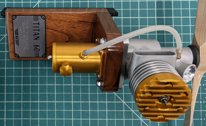 The glow-plug Titan .60 model airplane engine.
