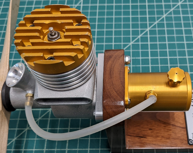 The glow-plug Titan .60 model airplane engine.