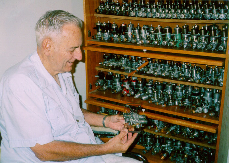 Dan Lutz Dan Lutz is shown in front of his large collection of model engines (mostly Ohlsson & Rice). He is holding a rare 4-cylinder engine.