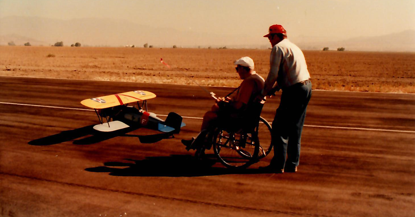 Dan With F4B-2 Biplane In this photo Dan is seated behind his F4B-2 biplane with controls in hand, preparing for takeoff.