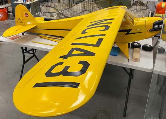 Scale Model R/C Piper Cub Although it's shown partially disassembled here, Mr. Lutz' scale model R/C Piper Cub is still in great condition.