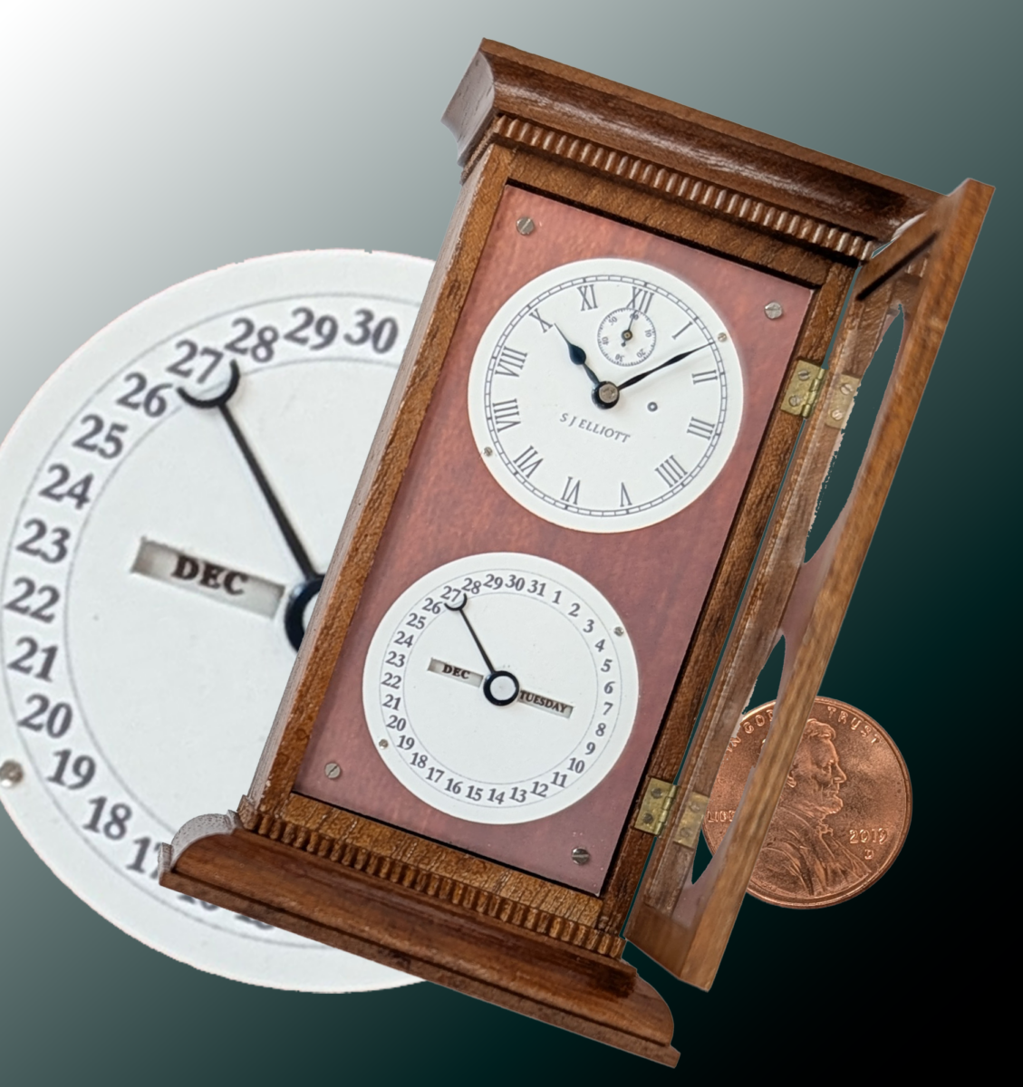Dual Movement Calendar Clock Dual Movement Calendar Clock. Materials: Stained cherry case, brass dial plate and hinges, plastic movements & batteries holder (PLA), glass. 1.7x2.8x1